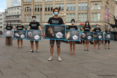 People demonstrate with signs