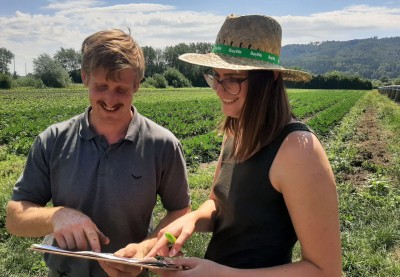 Two people are happy about their harvest