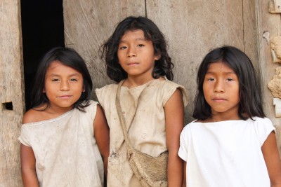 Children in front of a hut