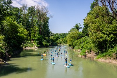 Students on SUPs on the water