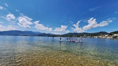 Students on SUPs on the water