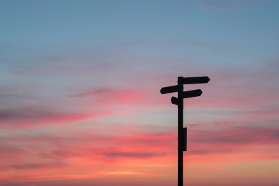 Signpost in the sunset